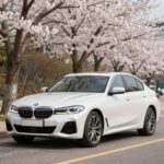 BMW 4월 프로모션으로 합리적인 차량 생활 시작하기 봄날 BMW 차량으로 드라이브하는 모습