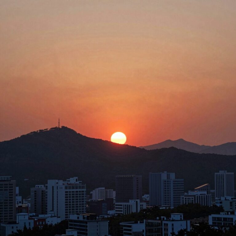 2026년 하지, 서울 하늘에 붉게 물든 노을이 지는 모습, 일몰 시간이 가장 긴 날의 풍경
