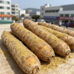 완성된 고구마줄기 볶음 사진, 들깨가루와 대파가 곁들여진 모습